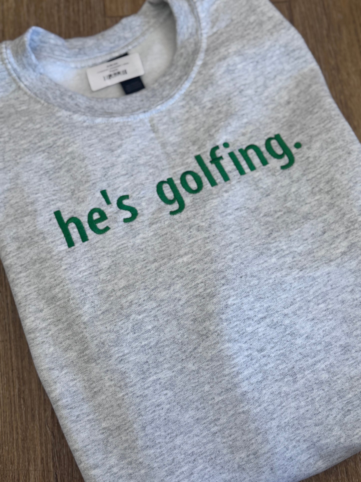 He’s Golfing Crewneck