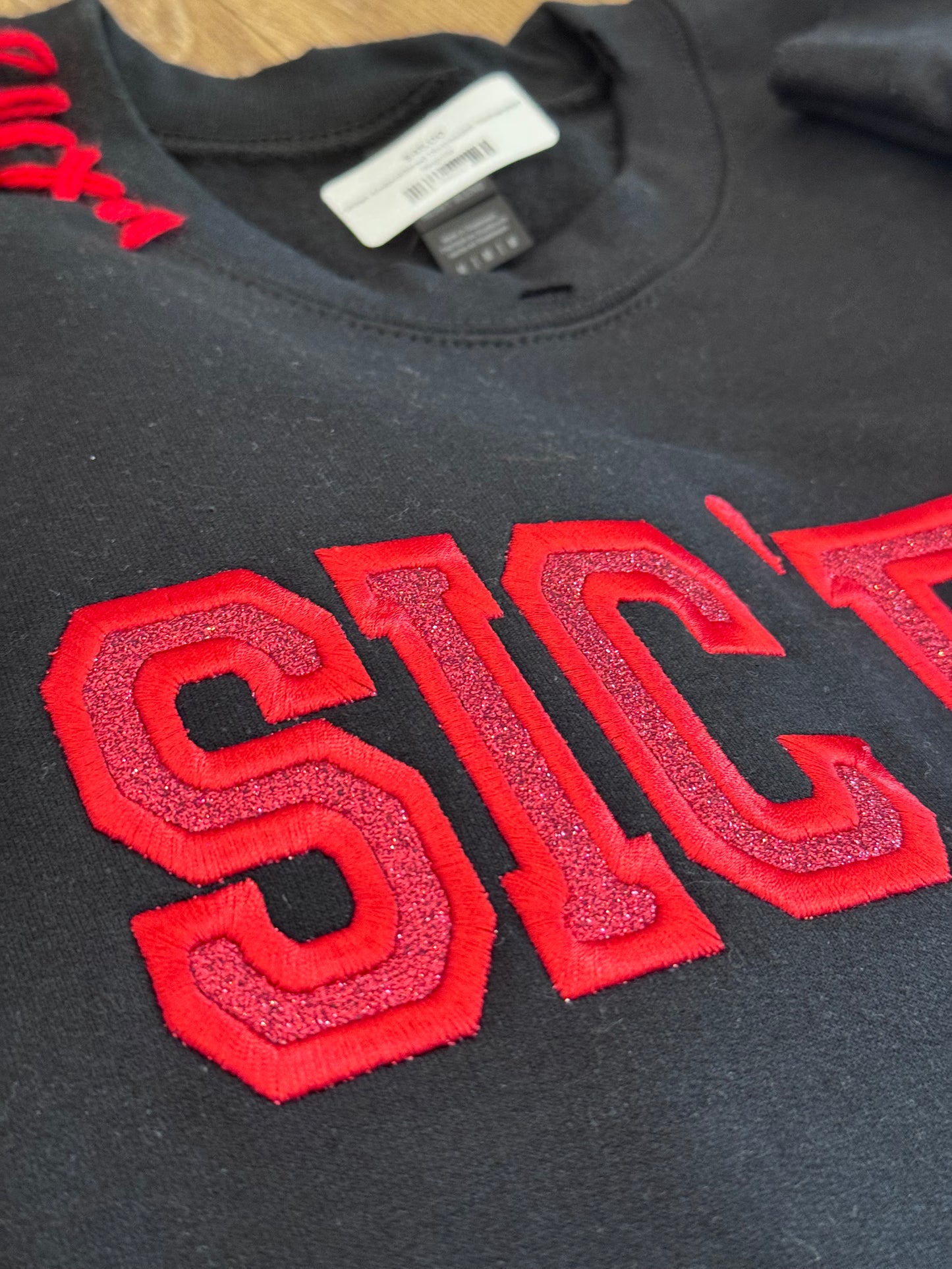 Embroidered Sic ‘Em Crewneck